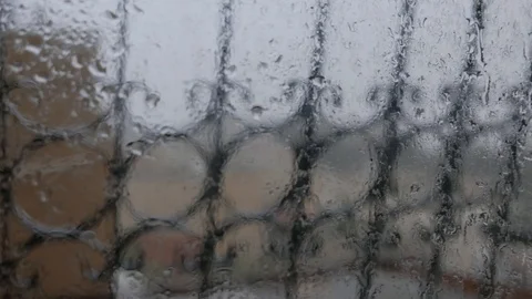 Rain Hits The Glass, The Defocused Window Grilles In The Background Stock Footage 88967502