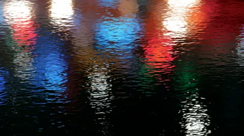 Rain hits the water surface reflecting night city lights 3D animation 스톡 동영상 63789308