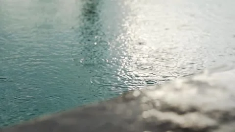 Rain Hitting a Pool of Water 스톡 동영상 136640189