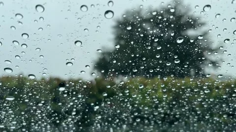 Rain hitting windshield glass Timelapse Stock Footage 213427671