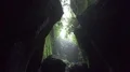 Rain inside a wet narrow gorge between tropic jungle mountain rocks in Bali 4k or 4k+ Resolution