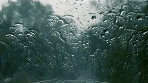 Rain from inside the window of the house Video stock 235340069