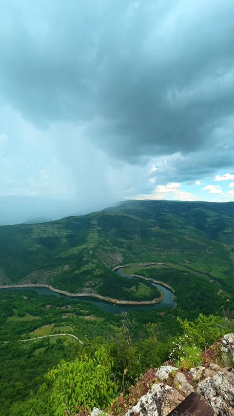 Rain lashes over green hills. Kozji Kamen viewpoint, Vertical 스톡 동영상 341882246