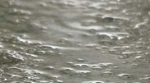 Rain macro bubbles on cement Video stock 50384091