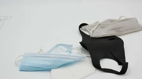 Rain of mask on a white background Stock Footage 144564588