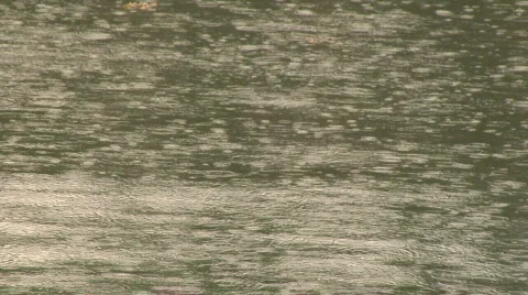 Rain on ocean surface with audio Stock Footage 156543