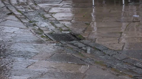 Rain on an old paved road Stock Footage 7154772