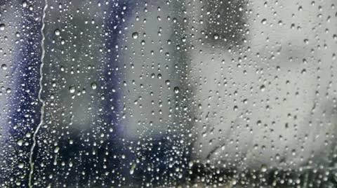 Rain on outside of clear tent panel fron inside Stock Footage 20431810