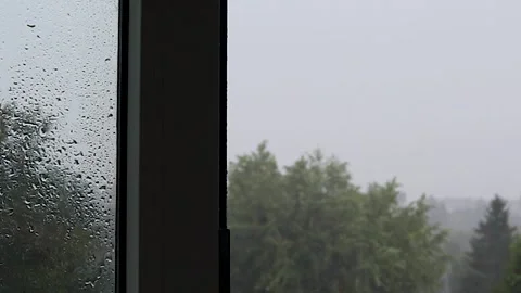 Rain Outside the Window Dripping on the Glass. Weather Cchange, Seasonality Stock Footage 246545077