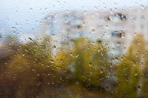 Rain outside the window, drops of rain on the windowpane Stock Photos