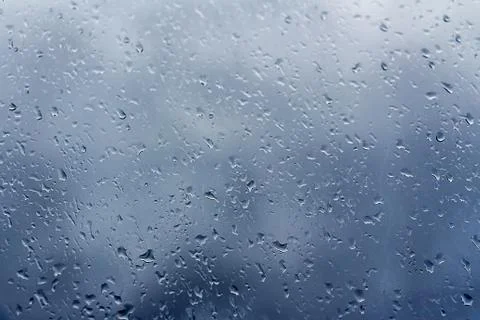 Rain outside the window, drops of rain on the windowpane Stock Photos