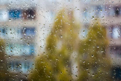 Rain outside the window, drops of rain on the windowpane Photos
