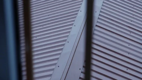 Rain outside the window, raindrops break on the roof Stock Footage 119883905