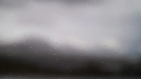 Rain outside the window, raindrops on the glass Stock Footage 137227249