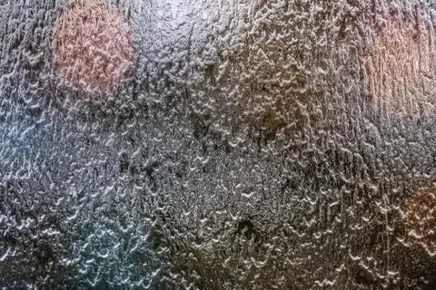 Rain outside the window. Water flows through the mirror, Abstract background Stock Photos