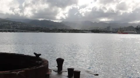 Rain over Honolulu as seen from the USS Arizona Memorial Stock Footage 67906116