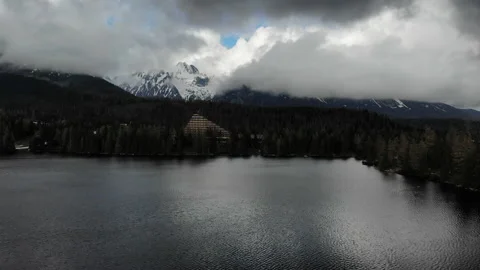 Rain over mountain lake with thunderclouds drone view Vídeos de archivo 237283299