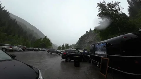 Rain in the parking lot in the mountains Stock Footage 197828085