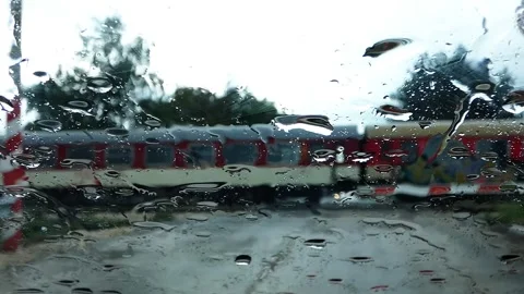 Rain Passing Seen Through Rain-Covered Windshield Stock Footage 321773877
