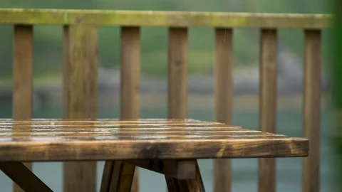 Rain on Picnic Bench Stock Footage 129323949