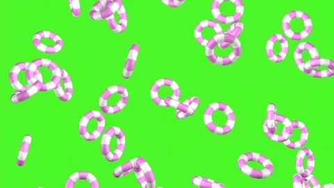 Rain from pink inflatable circles on a green screen. Stock Footage 246636996