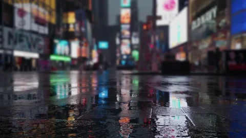 Rain pond splashes and reflection of Times Square in New York. Times Square i Stock Footage 246810076