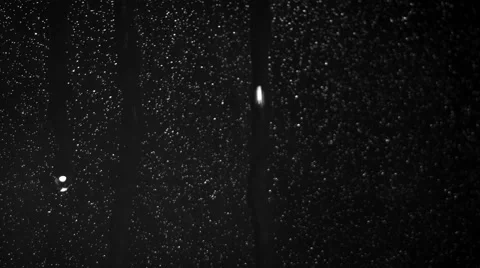 Rain pounding against the window on black background Video stock 52666587
