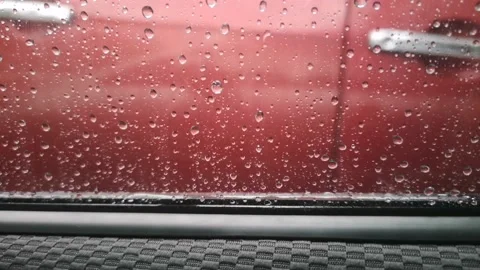 The rain poured down the car Stock Footage 131073837