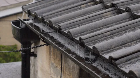 Rain pouring into gutter on side of house Stock Footage 37335244