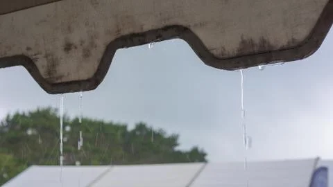 Rain in pouring over marquee Stock Photos