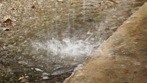 Rain pouring a waterfall caused broken roof gutter. Stock Footage 111498136