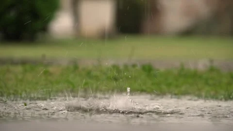 Rain with puddle Stock Footage 254423234
