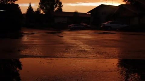 Rain Puddle in Parking Lot Stock Footage 40745128