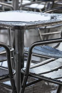 Rain puddle on the table Stock Photos