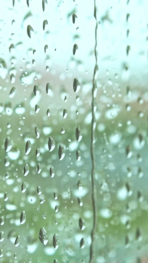 Rain Raining Against The Window On A Rainy Day Video stock 244050886