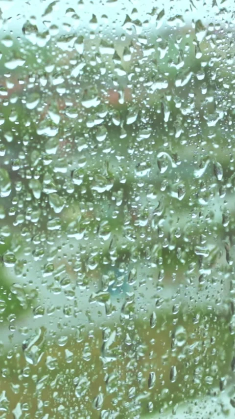 Rain Raining Against The Window On A Rainy Day Video stock 244051013
