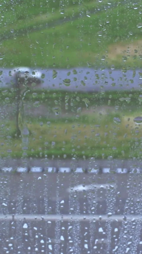 Rain Raining Against The Window On A Rainy Day Video stock 244051205