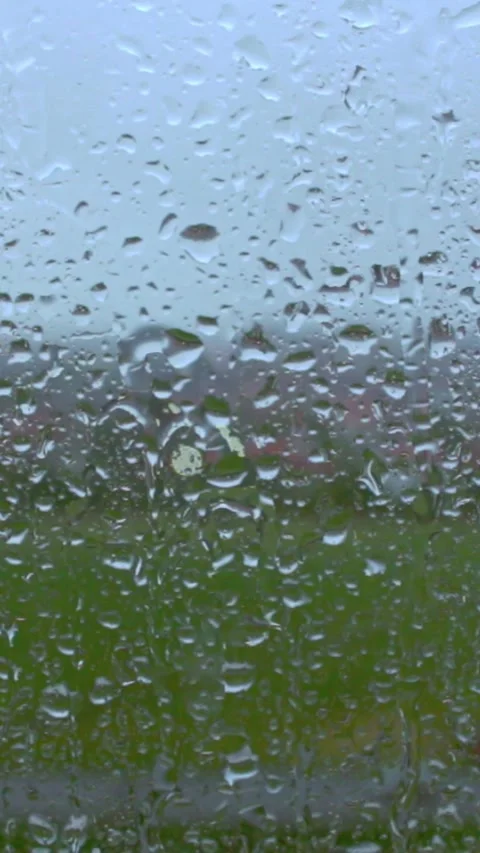 Rain Raining Against The Window On A Rainy Day Video stock 244051412