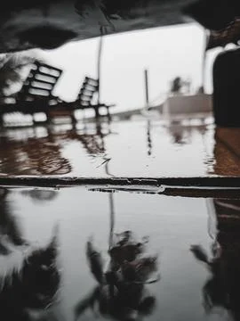 Rain reflected on the surface of the patio Stock Photos