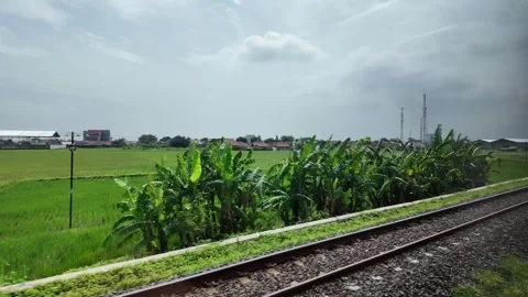 Rain ride through landscapes on Java Island in Indonesia Stock Footage 336946453