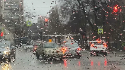 Rain on the road from car window, dangerous vehicle driving in rainy. Abstrac Stock Footage 142188219