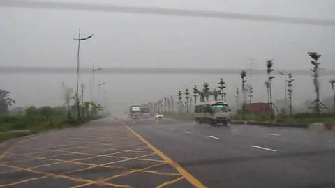 Rain on the road Stock Footage 78259898