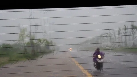 Rain on the road Stock Footage 78259933