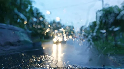 Rain on road , water flows on the windshield 002 Stock Footage 50711319