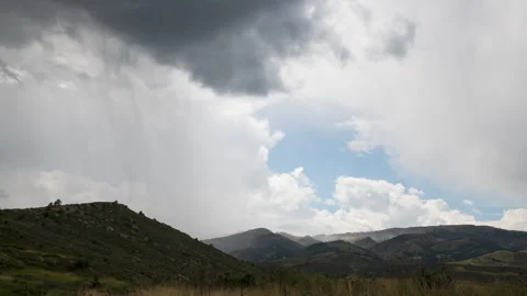Rain rolling off the mountains Stock Footage 272714525