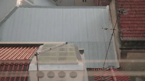 Rain on roofs Stock Footage 10881450