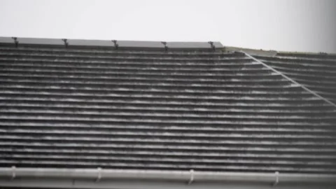 Rain on rooftop Stock Footage 213340101