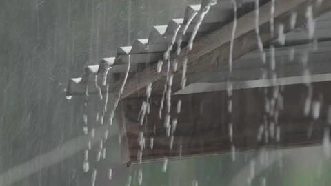 Rain running off a tin roof Stock Footage 340820523