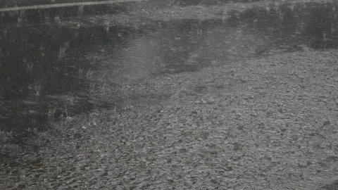 Rain at rush hour the streets of the city. The car goes through a puddle. Stock Footage 108616873