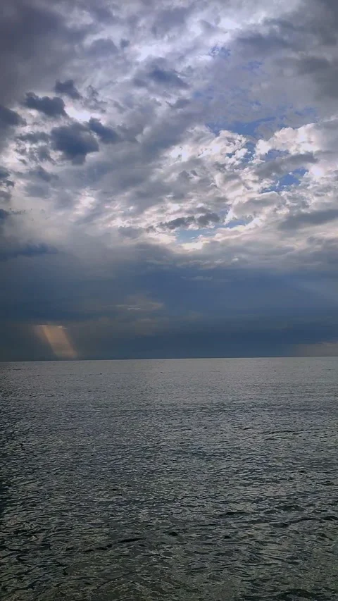 Rain sea Rain falling sea Cloudy rainy stormy weather Dark rainy clouds Vertical Stock-Footage 332278146